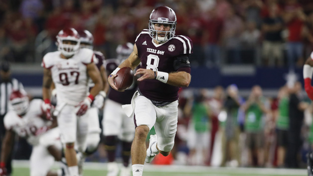 Sep 24, 2016; Dallas, TX, USA; Texas A&M Aggies quarterback Trevor Knight (8) runs for a touchdown in the second quarter against the Arkansas Razorbacks at AT&T Stadium. Photo Credit: Tim Heitman-USA TODAY Sports