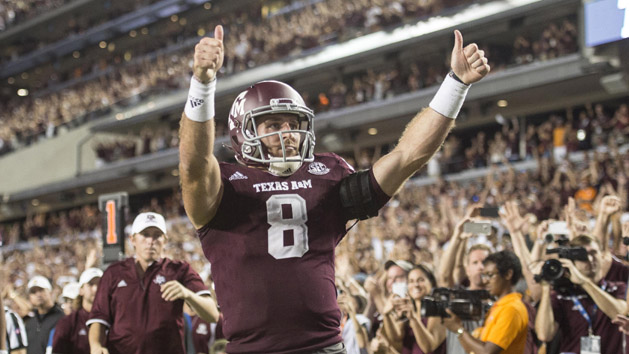 Oct 8, 2016; College Station, TX, USA; Texas A&M Aggies quarterback Trevor Knight (8) celebrates after scoring the game winning touchdown during the second overtime against the Tennessee Volunteers at Kyle Field. The Aggies defeated the Volunteers 45-38 in overtime. Photo Credit: Jerome Miron-USA TODAY Sports