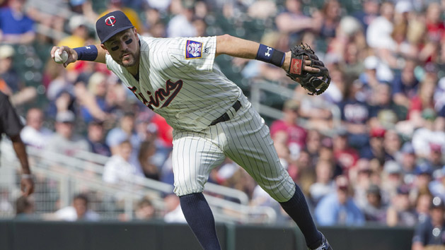 Apr 16, 2016; Minneapolis, MN, USA; Minnesota Twins third baseman Trevor Plouffe (24) throws the ball to first base for an out in the ninth inning against the Los Angeles Angels at Target Field. The Twins won 6-4. Mandatory Credit: Jesse Johnson-USA TODAY Sports