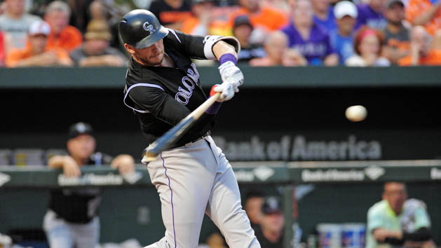 Jul 26, 2016; Baltimore, MD, USA; Colorado Rockies shortstop Trevor Story (27) hits a two run single in the third inning against the Baltimore Orioles at Oriole Park at Camden Yards. Photo Credit: Evan Habeeb-USA TODAY Sports