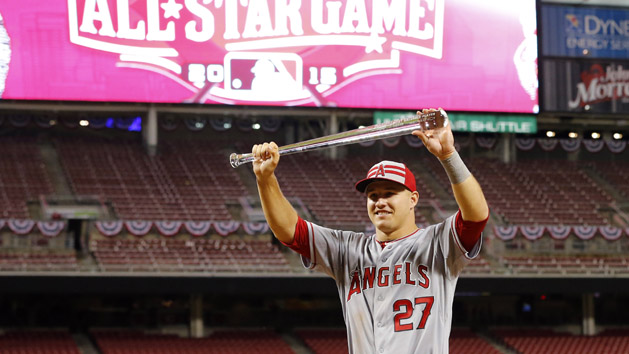Jul 14, 2015; Cincinnati, OH, USA; American League outfielder Mike Trout (27) of the Los Angeles Angels poses with the MVP trophy after the 2015 MLB All Star Game at Great American Ball Park. The American League all stars won 6-3. Mandatory Credit: Rick Osentoski-USA TODAY Sports
