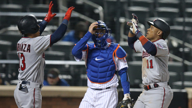 Apr 9, 2019; New York City, NY, USA; Minnesota Twins shortstop Jorge Polanco (11) celebrates his two run home run with shortstop Ehire Adrianza (13) in front of New York Mets catcher Travis d'Arnaud (18) during the eighth inning at Citi Field. Photo Credit: Brad Penner-USA TODAY Sports
