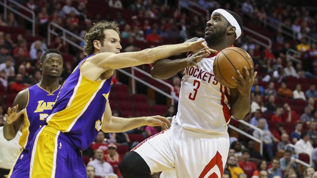 Ty Lawson (3) drives to the basket as Los Angeles Lakers guard Marcelo Huertas (9) defends during the first quarter at Toyota Center last year. Photo Credit: Troy Taormina-USA TODAY Sports