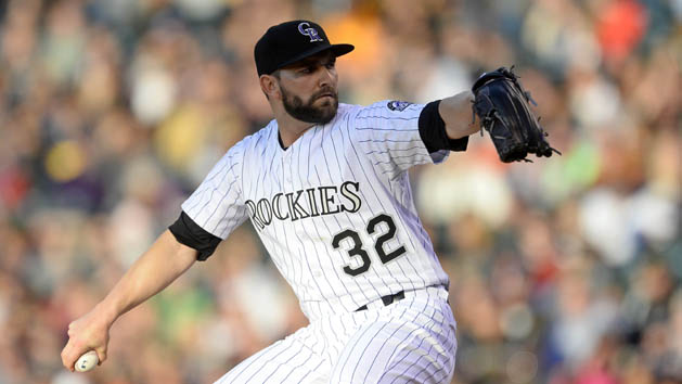 May 27, 2016; Denver, CO, USA; Colorado Rockies starting pitcher Tyler Chatwood (32) delivers a pitch in the first inning against the San Francisco Giants at Coors Field. Mandatory Credit: Ron Chenoy-USA TODAY Sports