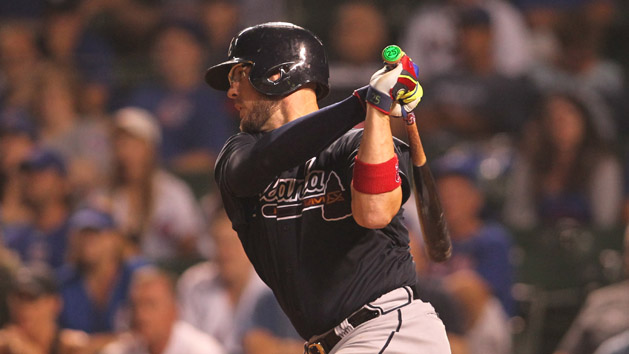 Jul 7, 2016; Chicago, IL, USA; Atlanta Braves catcher Tyler Flowers (25) hits an RBI single during the eleventh inning against the Chicago Cubs at Wrigley Field. Photo Credit: Caylor Arnold-USA TODAY Sports