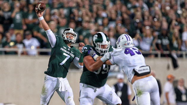 Sep 2, 2016; East Lansing, MI, USA; Michigan State Spartans quarterback Tyler O'Connor (7) throws the ball against the Furman Paladins during the second half of a game at Spartan Stadium. Photo Credit: Mike Carter-USA TODAY Sports