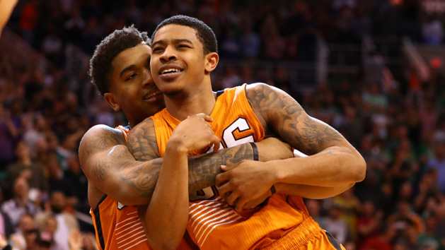 Mar 5, 2017; Phoenix, AZ, USA; Phoenix Suns guard Tyler Ulis (right) is lifted up by teammate Marquese Chriss as they celebrate Ulis buzzerbeater against the Boston Celtics at Talking Stick Resort Arena. The Suns defeated the Celtics 109-106. Photo Credit: Mark J. Rebilas-USA TODAY Sports