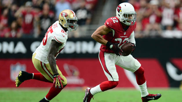 Sep 27, 2015; Glendale, AZ, USA; Arizona Cardinals free safety Tyrann Mathieu (32) intercepts a pass intended for San Francisco 49ers tight end Vernon Davis (85) during the first half at University of Phoenix Stadium. Photo Credit: Joe Camporeale-USA TODAY Sports