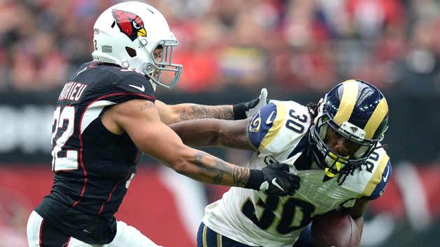 Oct 2, 2016; Glendale, AZ, USA; Arizona Cardinals free safety Tyrann Mathieu (32) attempts to tackle Los Angeles Rams running back Todd Gurley (30) during the second half at University of Phoenix Stadium. The Rams won 17-13. Photo Credit: Joe Camporeale-USA TODAY Sports