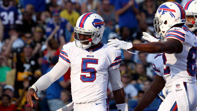 Aug 29, 2015; Orchard Park, NY, USA; Buffalo Bills quarterback Tyrod Taylor (5) celebrates his second half touchdown against the Pittsburgh Steelers at Ralph Wilson Stadium. Bills beat the Steelers 43 to 19. Mandatory Credit: Timothy T. Ludwig-USA TODAY Sports
