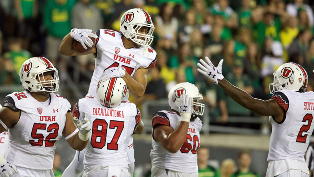 Sep 26, 2015; Eugene, OR, USA; Utah Utes tight end Caleb Repp (47) celebrates a touchdown with offensive tackle Sam Tevi (52) and tight end Siale Fakailoatonga (87) and offensive lineman Siaosi Aiono (60) and wide receiver Kenneth Scott (2) against the Oregon Ducks at Autzen Stadium. Mandatory Credit: Scott Olmos-USA TODAY Sports