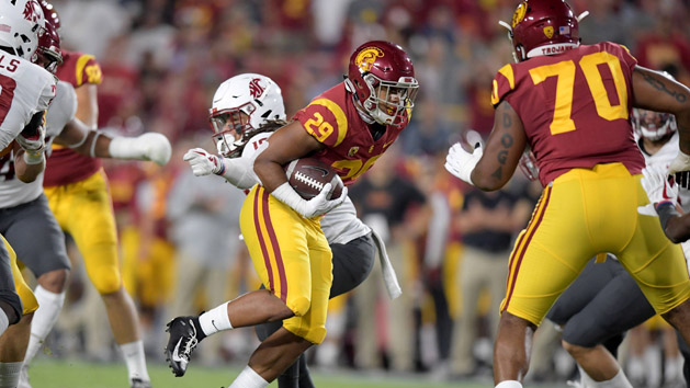 Sep 21, 2018; Los Angeles, CA, USA; Southern California Trojans running back Vavae Malepeai (29) carries the ball against Washington State Cougars linebacker Jahad Woods (13) in the first quarter at Los Angeles Memorial Coliseum. Photo Credit: Kirby Lee-USA TODAY Sports