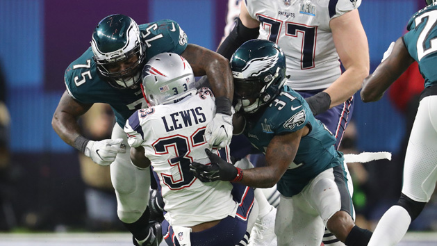 Feb 4, 2018; Minneapolis, MN, USA; Philadelphia Eagles defensive end Vinny Curry (75) and cornerback Jalen Mills (31) tackle New England Patriots running back Dion Lewis (33) in Super Bowl LII at U.S. Bank Stadium. Photo Credit: Matthew Emmons-USA TODAY Sports