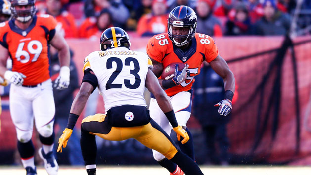 Jan 17, 2016; Denver, CO, USA; Denver Broncos tight end Virgil Green (85) runs the ball against Pittsburgh Steelers free safety Mike Mitchell (23) in the first quarter in an AFC Divisional round playoff game at Sports Authority Field at Mile High. Mandatory Credit: Isaiah J. Downing-USA TODAY Sports