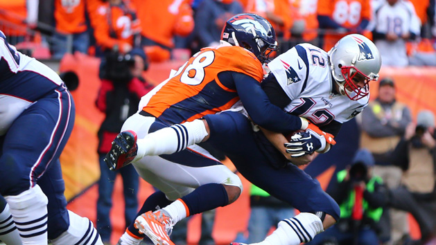Jan 24, 2016; Denver, CO, USA; New England Patriots quarterback Tom Brady (12) is sacked by Denver Broncos outside linebacker Von Miller (58) in the second half in the AFC Championship football game at Sports Authority Field at Mile High. Mandatory Credit: Mark J. Rebilas-USA TODAY Sports