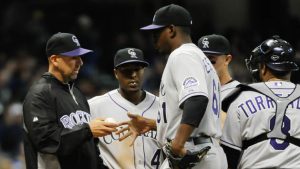 Weiss gets first victory as Rockies beat Brewers