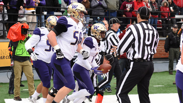 Nov 25, 2016; Pullman, WA, USA; Washington Huskies wide receiver John Ross (1) celebrates a touchdown against the Washington State Cougars during the first half at Martin Stadium. Photo Credit: James Snook-USA TODAY Sports