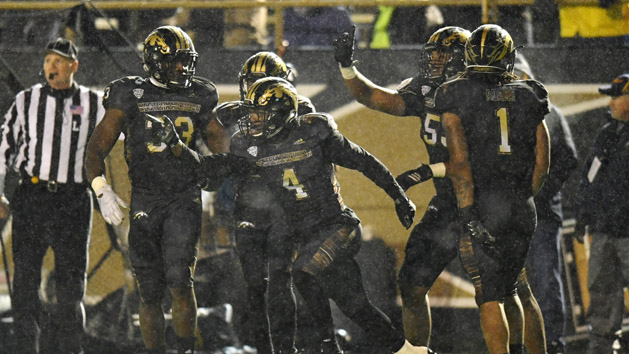 Nov 25, 2016; Kalamazoo, MI, USA; Western Michigan Broncos cornerback Darius Phillips (4) celebrates after an interception against the Toledo Rockets during the second half at Waldo Stadium. The Broncos won 55-35. Photo Credit: Patrick Gorski-USA TODAY Sports