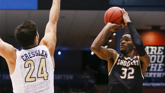 Mar 15, 2016; Dayton, OH, USA; Wichita State Shockers forward Markis McDuffie (32) shoots while guarded by Vanderbilt Commodores guard Nolan Cressler (24) during the second half of the First Four of the NCAA men's college basketball tournament at Dayton Arena. Mandatory Credit: Rick Osentoski-USA TODAY Sports