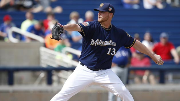 Mar 11, 2016; Phoenix, AZ, USA; Milwaukee Brewers relief pitcher Will Smith (13) throws in the third inning during a spring training game against the Texas Rangers at Maryvale Baseball Park. Mandatory Credit: Rick Scuteri-USA TODAY Sports