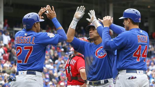 Apr 22, 2017; Cincinnati, OH, USA; Chicago Cubs catcher Willson Contreras (middle) reacts with shortstop Addison Russell (27) and first baseman Anthony Rizzo (44) after Contreras hit a grand slam home run against the Cincinnati Reds during the second inning at Great American Ball Park. Photo Credit: David Kohl-USA TODAY Sports