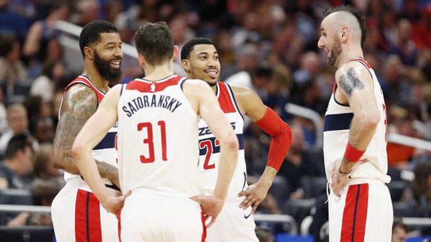 Feb 3, 2018; Orlando, FL, USA; Washington Wizards forward Markieff Morris (5), forward Tomas Satoransky (31),forward Otto Porter Jr. (22) and center Marcin Gortat (13) talk against the Orlando Magic during the second half at Amway Center. Photo Credit: Kim Klement-USA TODAY Sports