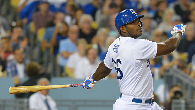 Aug 11, 2015; Los Angeles, CA, USA; Los Angeles Dodgers right fielder Yasiel Puig (66) hits a 3 RBI triple in the fifth inning of the game against the Washington Nationals at Dodger Stadium. Mandatory Credit: Jayne Kamin-Oncea-USA TODAY Sports