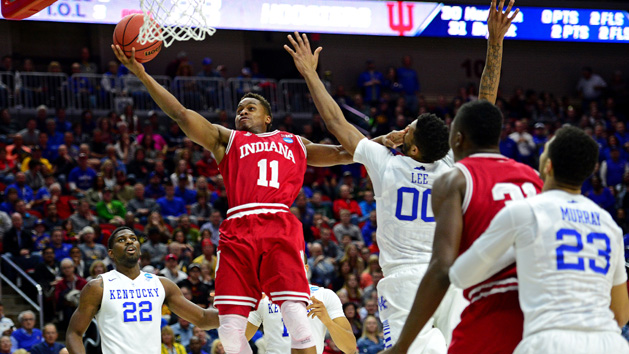 Mar 19, 2016; Des Moines, IA, USA; Indiana Hoosiers guard Yogi Ferrell (11) shoots the ball against Kentucky Wildcats forward Marcus Lee (00) in the second half during the second round of the 2016 NCAA Tournament at Wells Fargo Arena. Mandatory Credit: Jeffrey Becker-USA TODAY Sports
