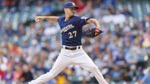 Brewers acquire Urias, send Grisham to Padres