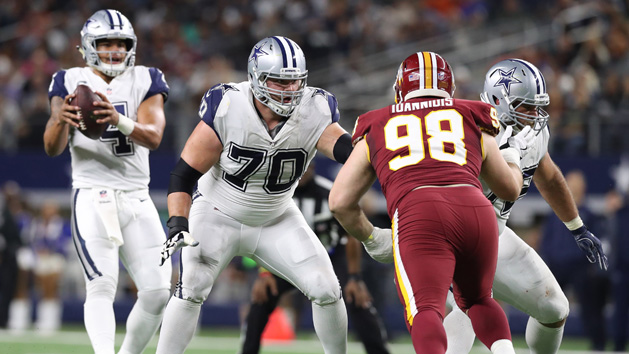 Nov 30, 2017; Arlington, TX, USA; Dallas Cowboys guard Zack Martin (70) and center Travis Frederick (72) block for quarterback Dak Prescott (4) against the Washington Redskins at AT&T Stadium. Mandatory Credit: Matthew Emmons-USA TODAY Sports